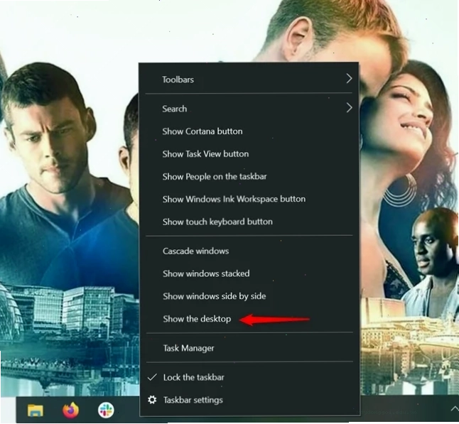 Nhấp chuột phải vào vùng trống trên Taskbar để hiển thị tùy chọn Show the desktop